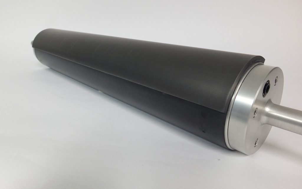 New Way Air Turn featuring a porous media wrap which uses air to move a product without contact or moving parts.